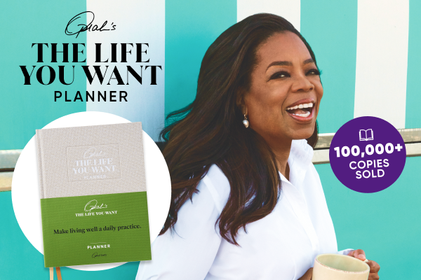 Oprah smiling while holding a mug. Inlay of the Oprah Daily The Life You Want Planner. 100,000+ copies sold